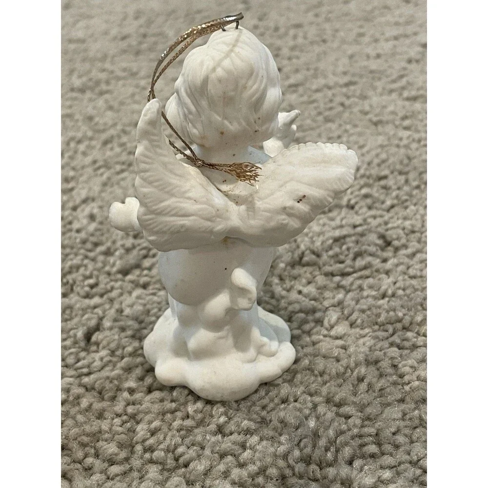 WHITE PORCELAIN ANGEL W/ 3 PORCELAIN ROSES HOLDING A‎ DOVE ORNAMENT